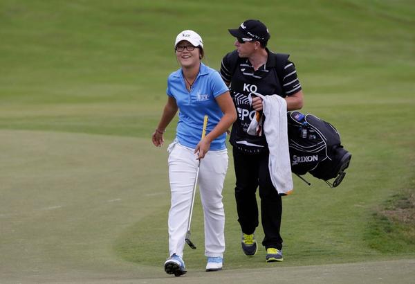 Lydia Ko's caddy hard at work at the 2012 NZ PGA Championship at The Hills, Queenstown.